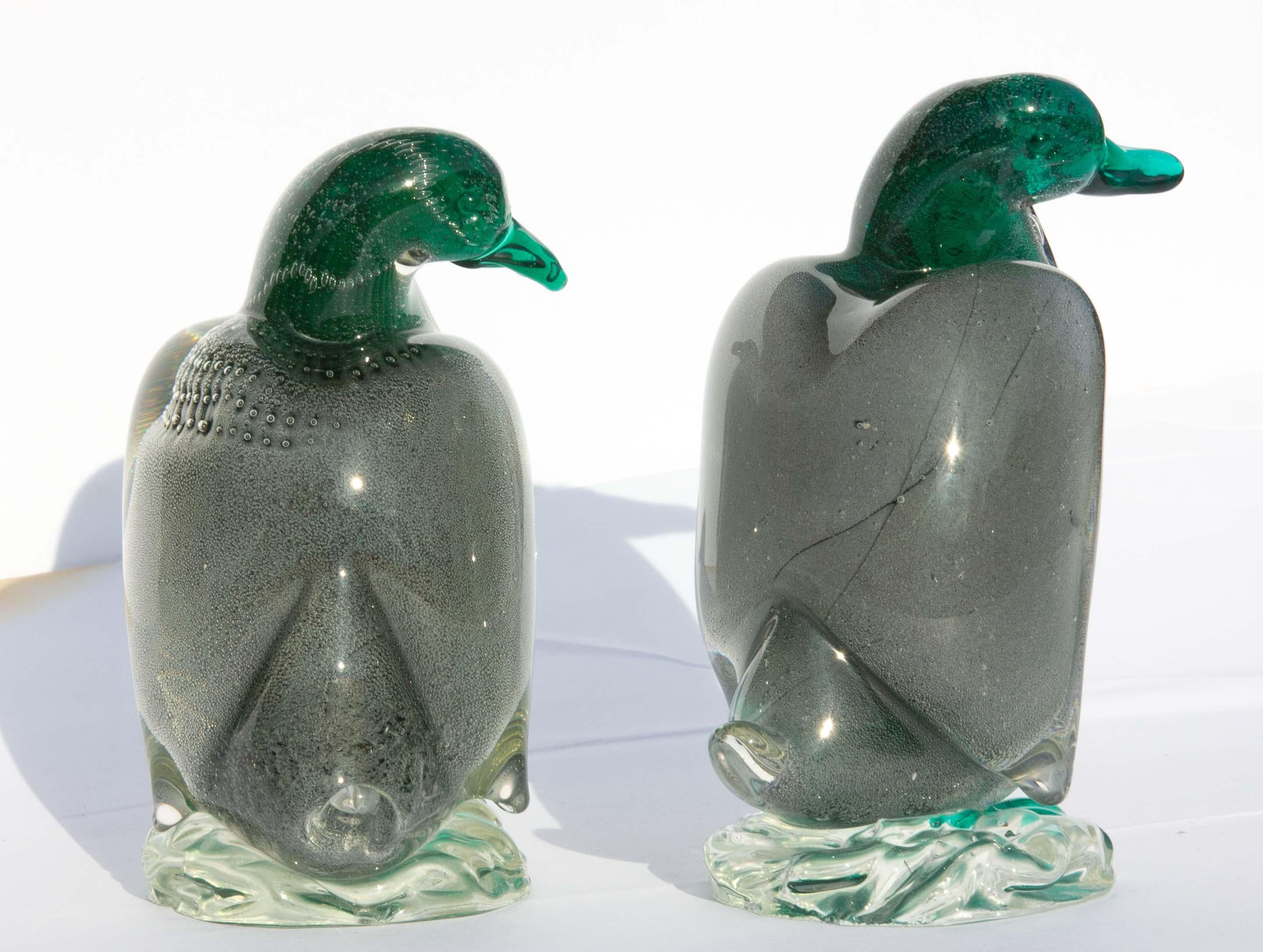 Pair of Murano glass ducks. Emerald green and gray with gold flecks. Heavy solid glass. Attributed to Alfredo Barbini, circa 1930s.