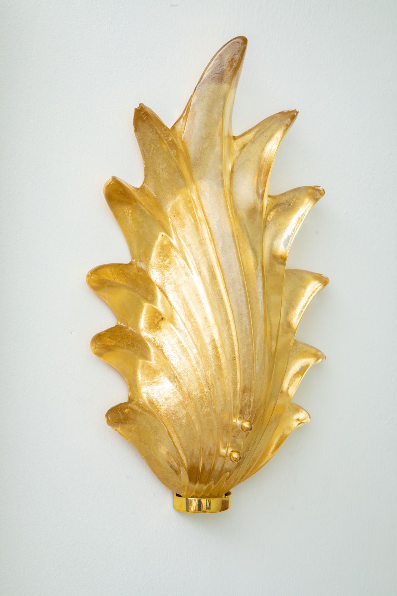 Pair of Murano gilded leaf glass and brass wall lights, in stock
1 G9 LED bulb
Wired to the American standard
Similar pair available in clear and green 
Priced per pair
Available to view in situ in our Miami gallery