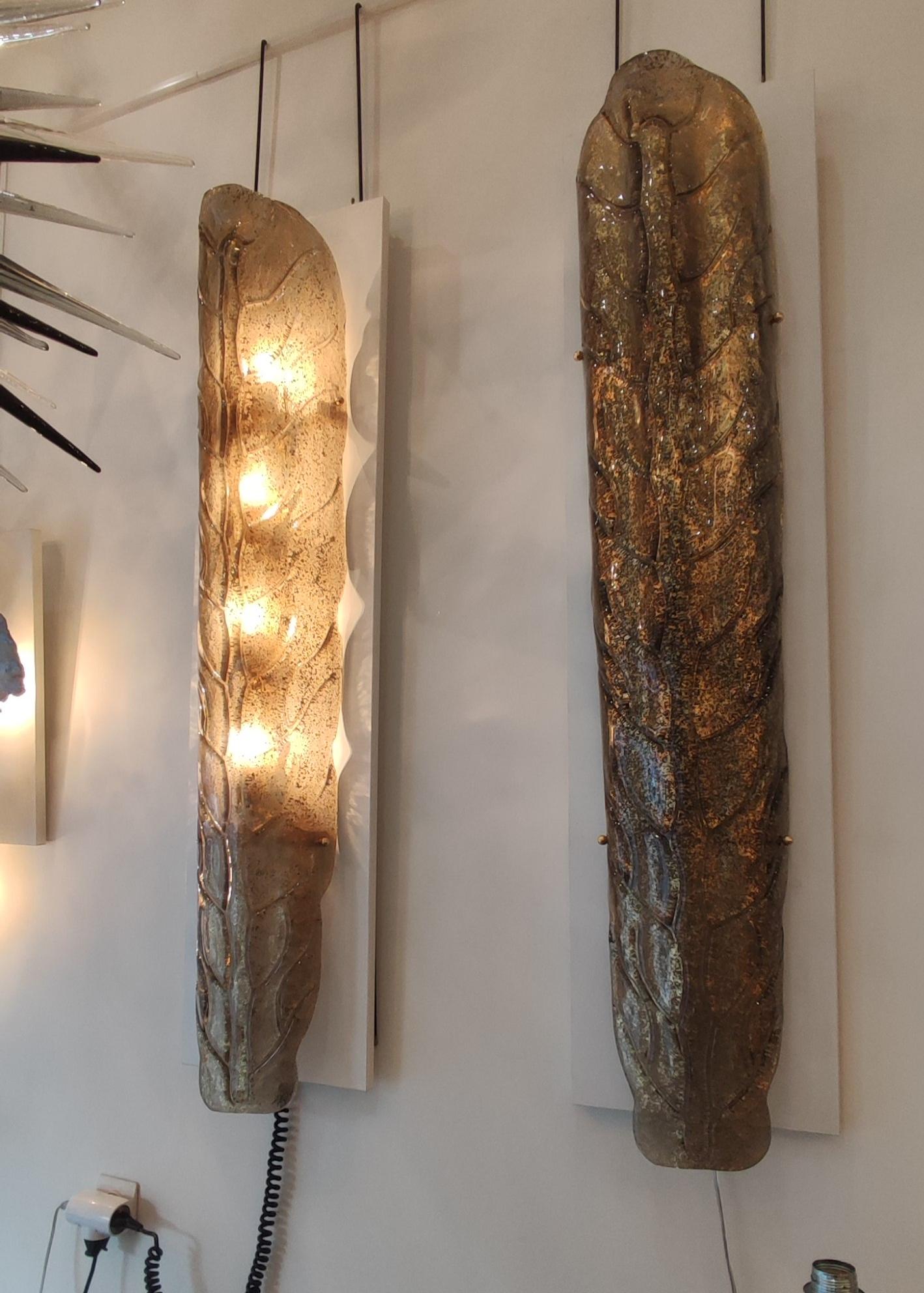 Pair of large and spectacular Murano glass wall sconces. 
 
Four bulbs E27 by sconce. ( four Europe and USA as well).

 