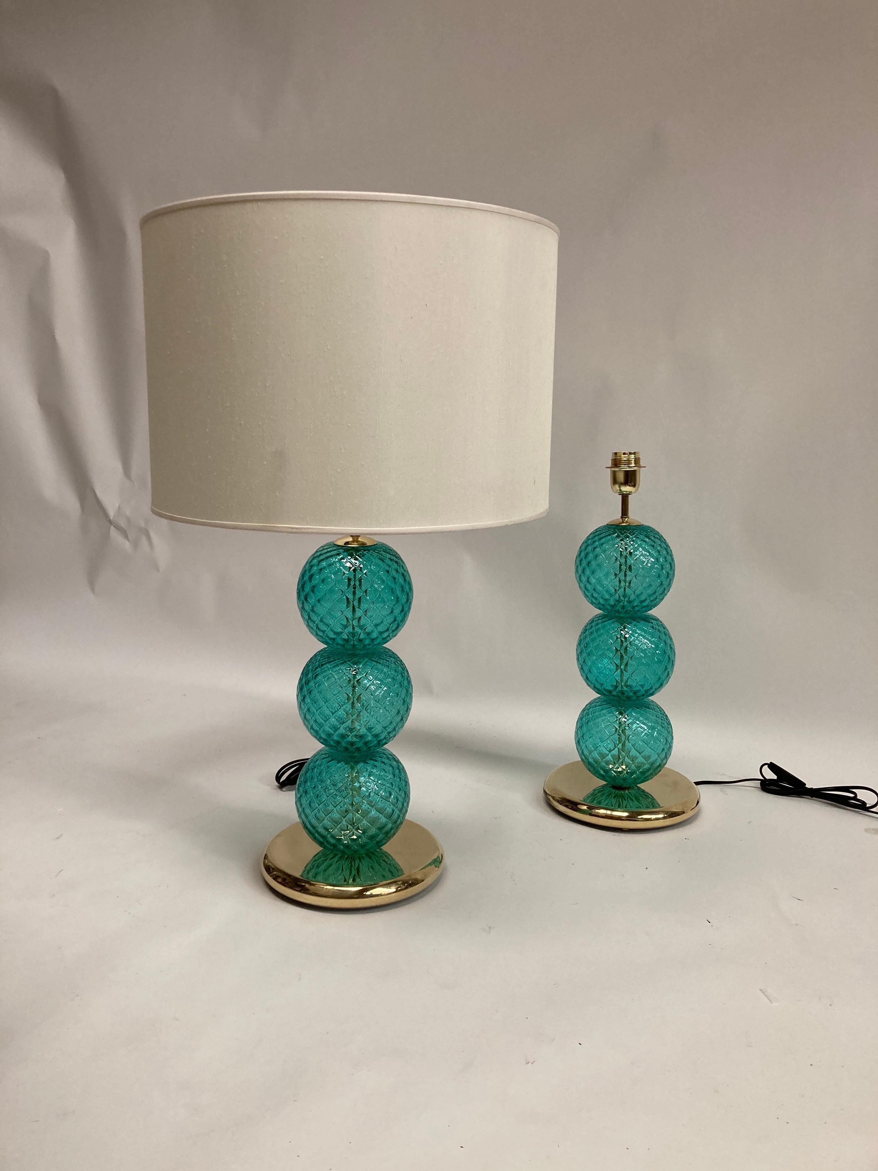 Very nice pair of table lamps made with Murano glass bowls
Italy.