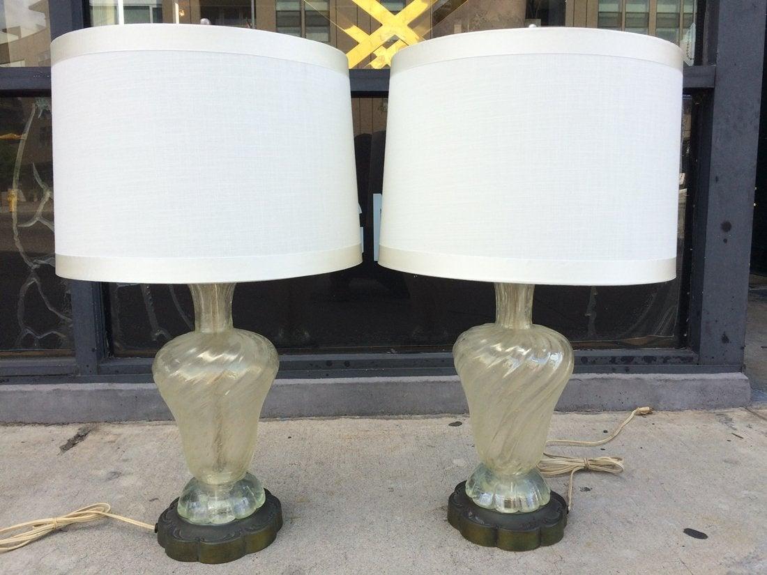 Beautiful pair of Murano glass lamps designed and manufactured in Italy, the lamps have beautiful bronze bases and are in very good condition, shades are not included.
Measurements:
28