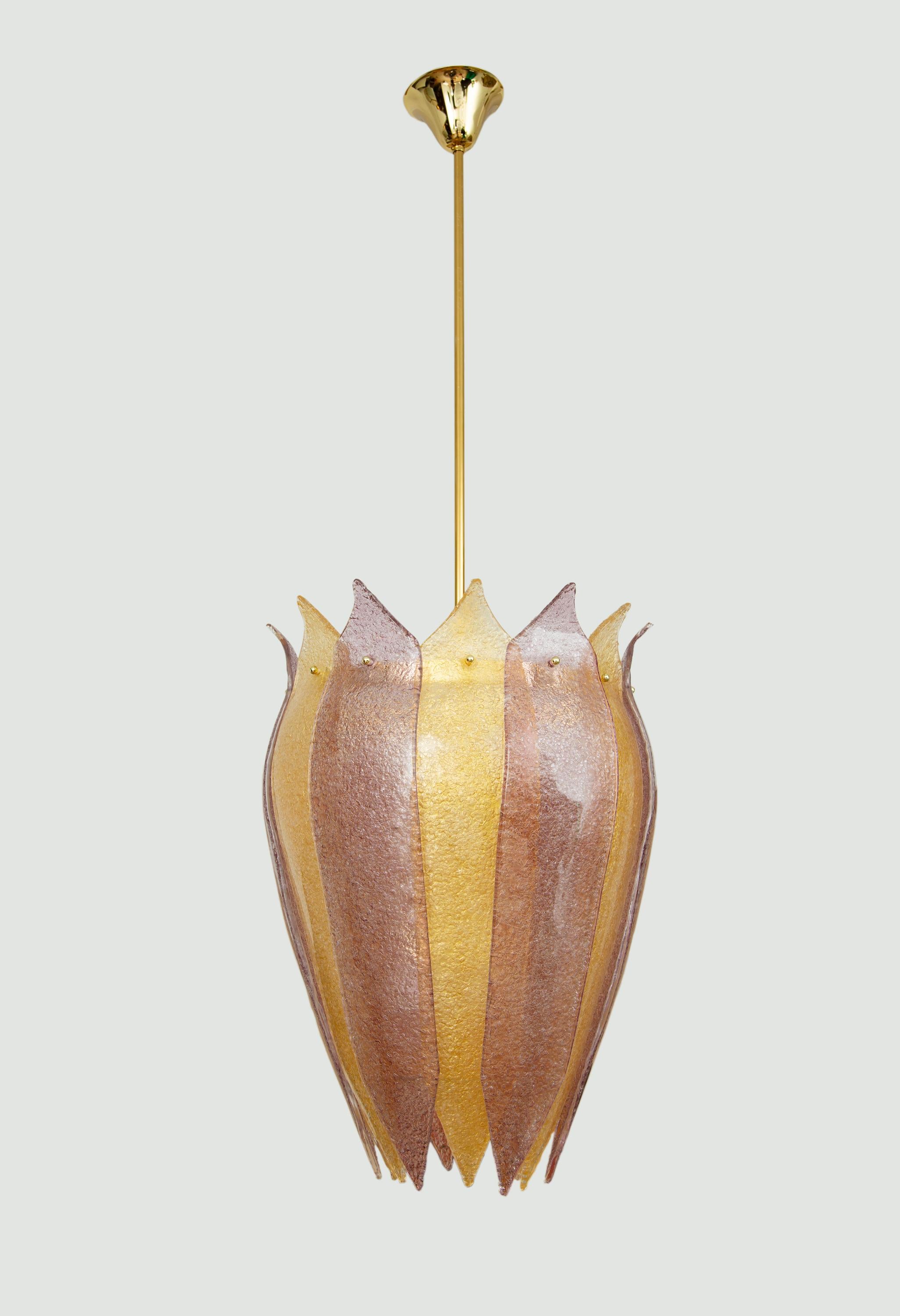 Pair of Murano glass lantern or cesendello, in stock
Curved form “graniglia” hand blown glass leaves in gold and amethyst.
Silhouette is inspired by the ancient street lanterns of Venice
Brass structure with a 65