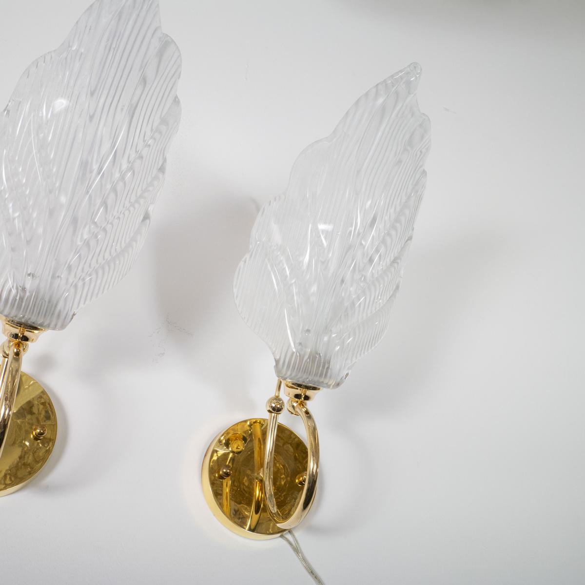 Brass Pair of Murano glass leaf sconces For Sale