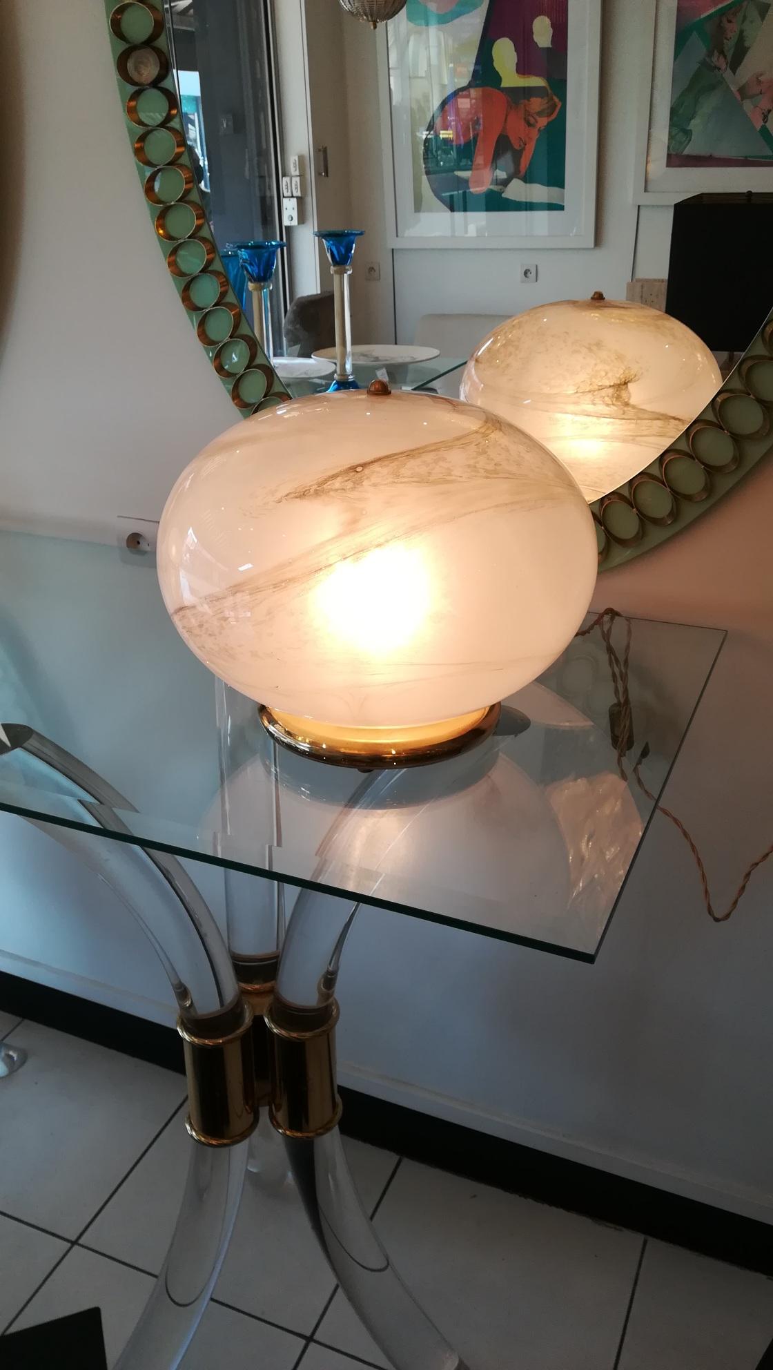 Pair of murano glass round table lamp, brass feet.