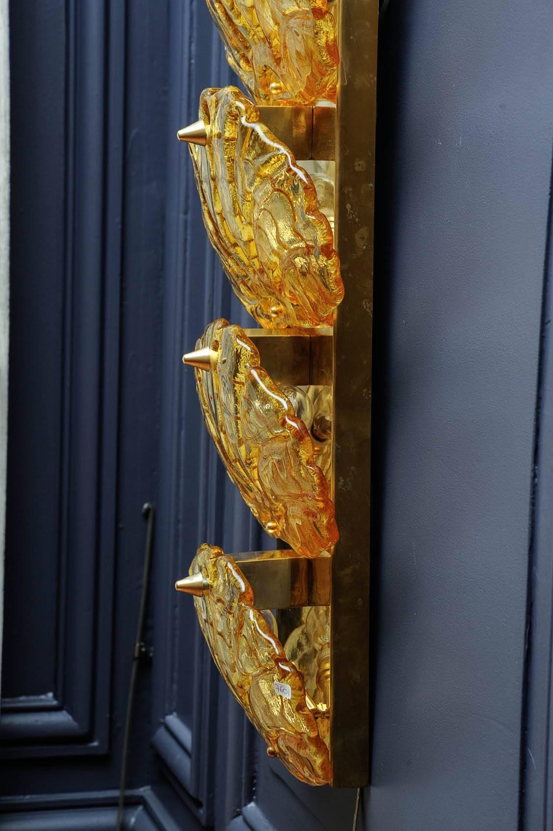 Contemporary Pair of Murano Glass Sconces at cost price. For Sale