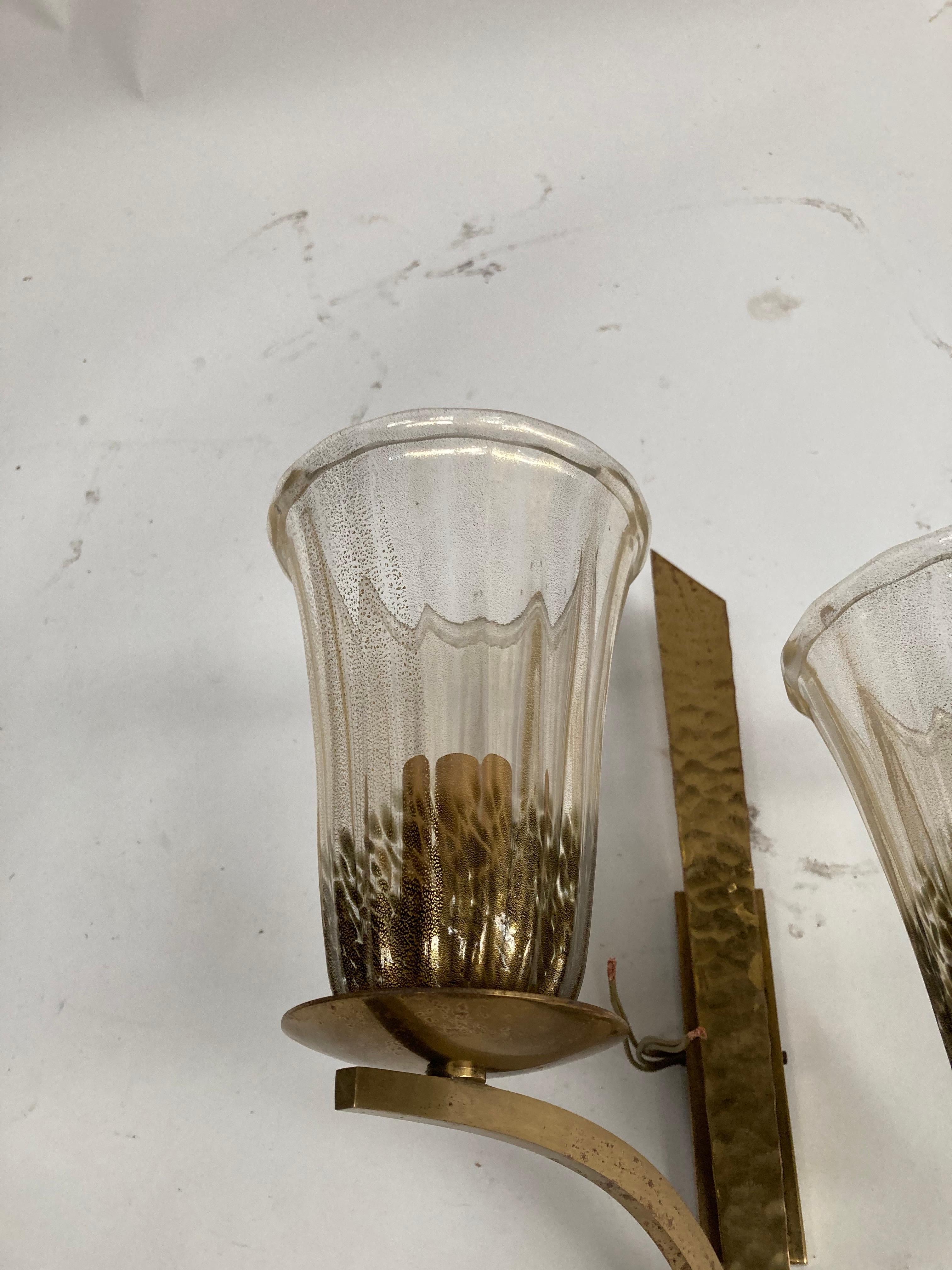 Very interesting pair of brass sconces with Murano glass
Circa 1960's.