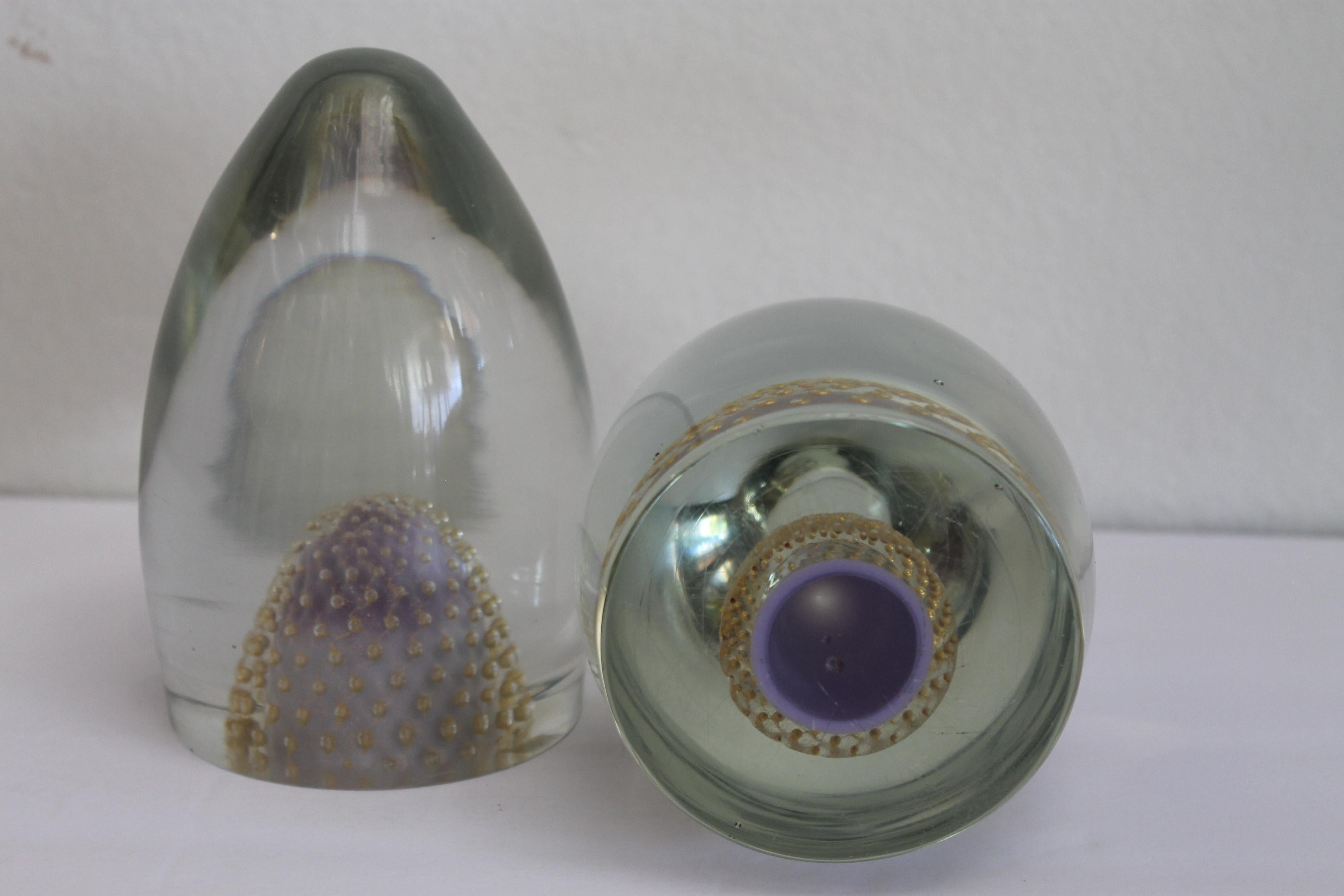 Pair of Murano glass bullet shaped sculptures or bookends attributed to Barovier. Each measure 6.25