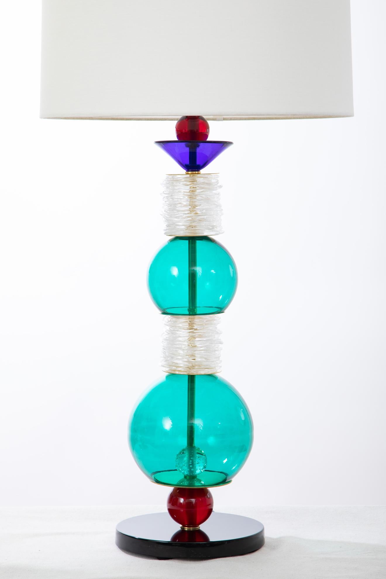 Pair of studio Murano glass table lamps, Italy in stock.
One of a kind colorful table lamps.
Wired to the American standard.
31.5