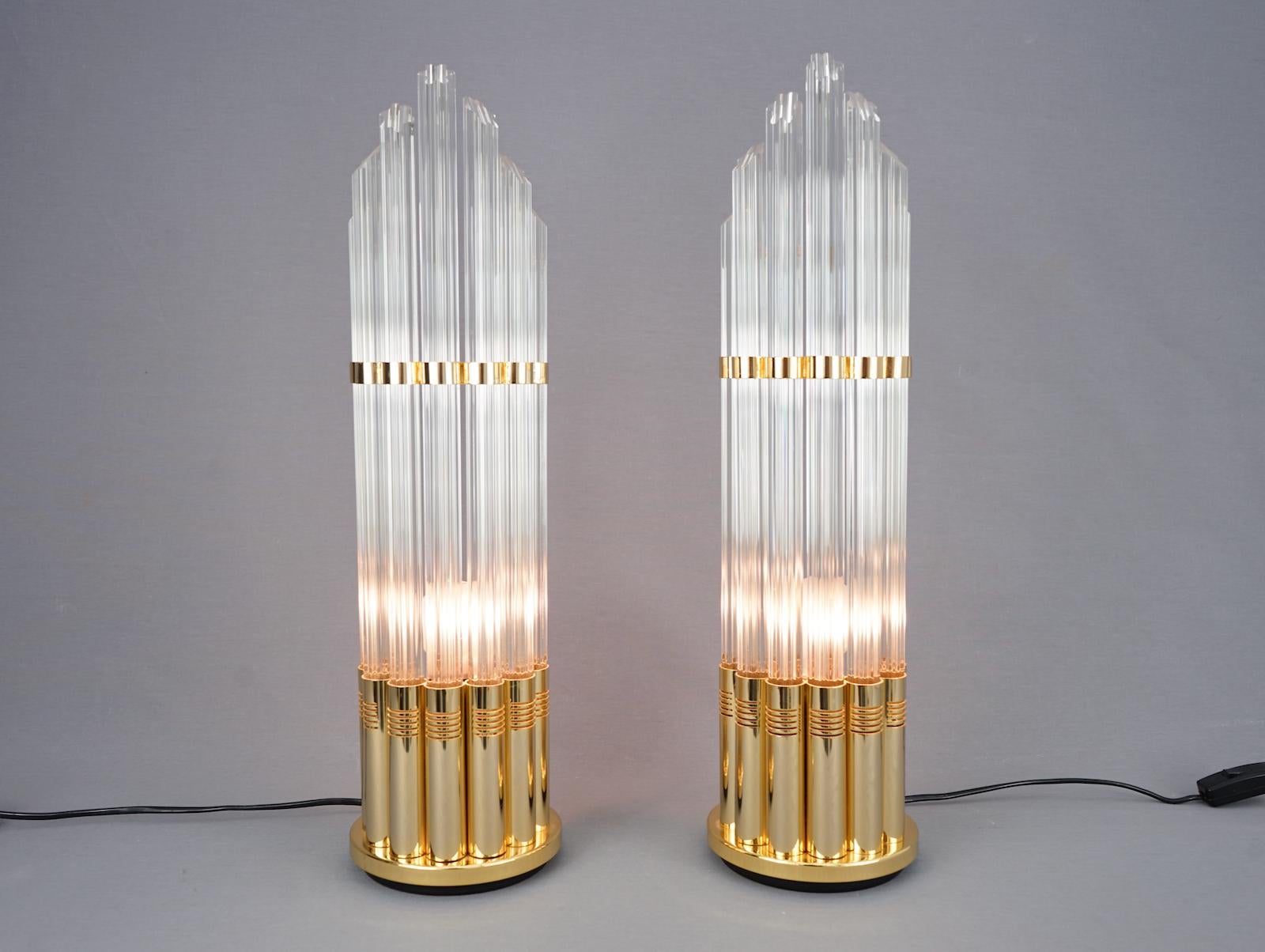 Pair of Murano glass table lamps with gilded base, Italy 1970s.

Very good condition.
