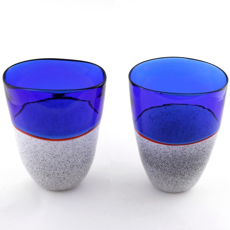 A pair of beautiful and rare Italian glass vases from the 'Istria series' by Lino Tagliapietra and Marina Angelin for Effetre International, Murano, 1986.
The vases are made of hand blown glass composed of blue, red, white, and black glass.
Each