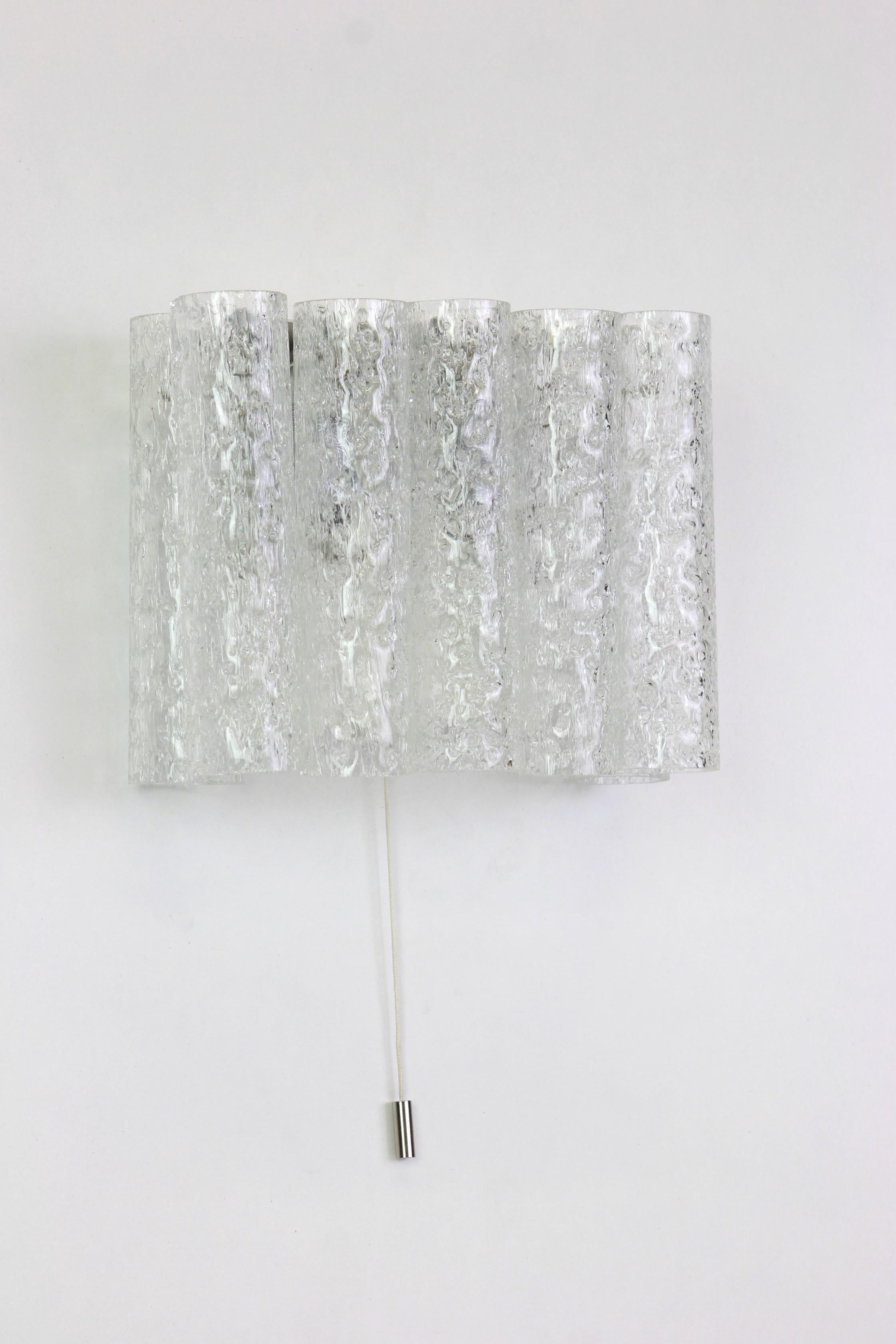 Wonderful pair of midcentury wall sconces with Murano glass tubes, made by Doria Leuchten, Germany, manufactured, circa 1960-1969.

Each sconce needs two E14 small bulb.

Heavy quality and in very good condition. Cleaned, well-wired and ready to