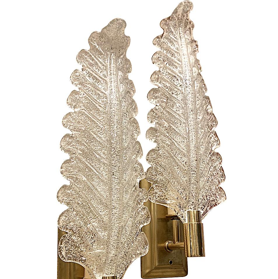 Pair of circa 1960's Italian Murano glass leaf-shaped sconces with gilt hardware. Sold per pair.

Measurements:
Height: 14.5