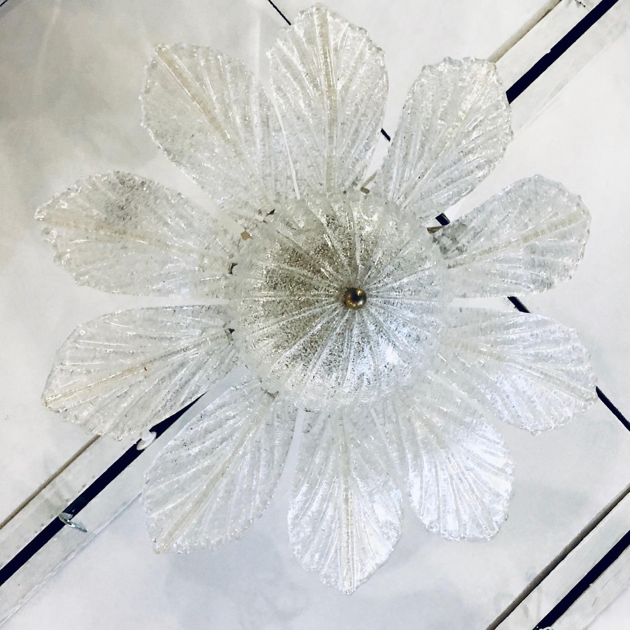 A pair of circa 1940s Italian Murano pendant light fixtures in the form of a flower. Sold Individually.

Measurements:
Diameter 24?
Drop (adjustable) 16?.