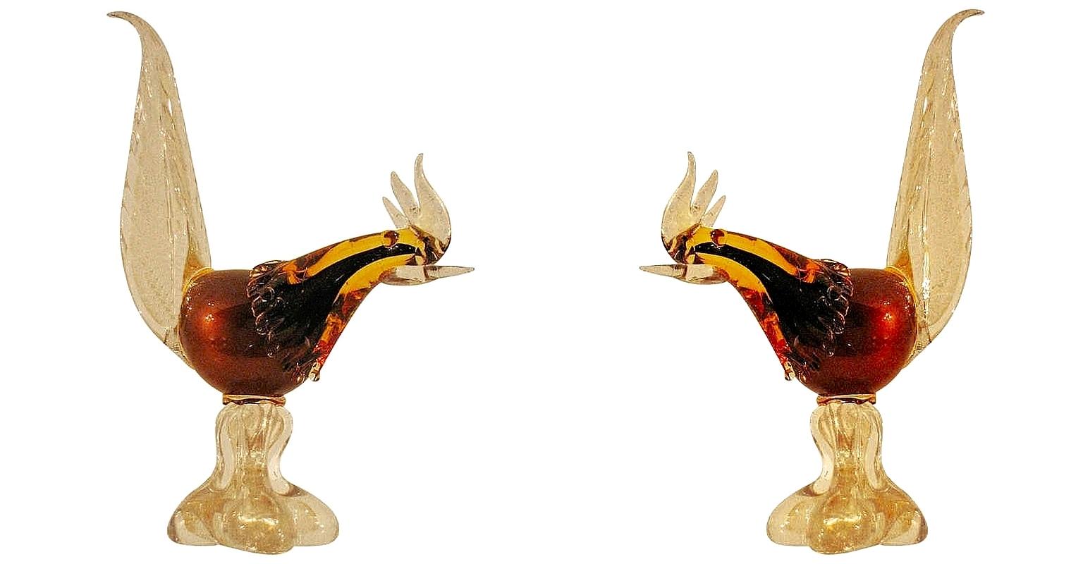 Pair of Murano pheasant in dark amber and gold tones.