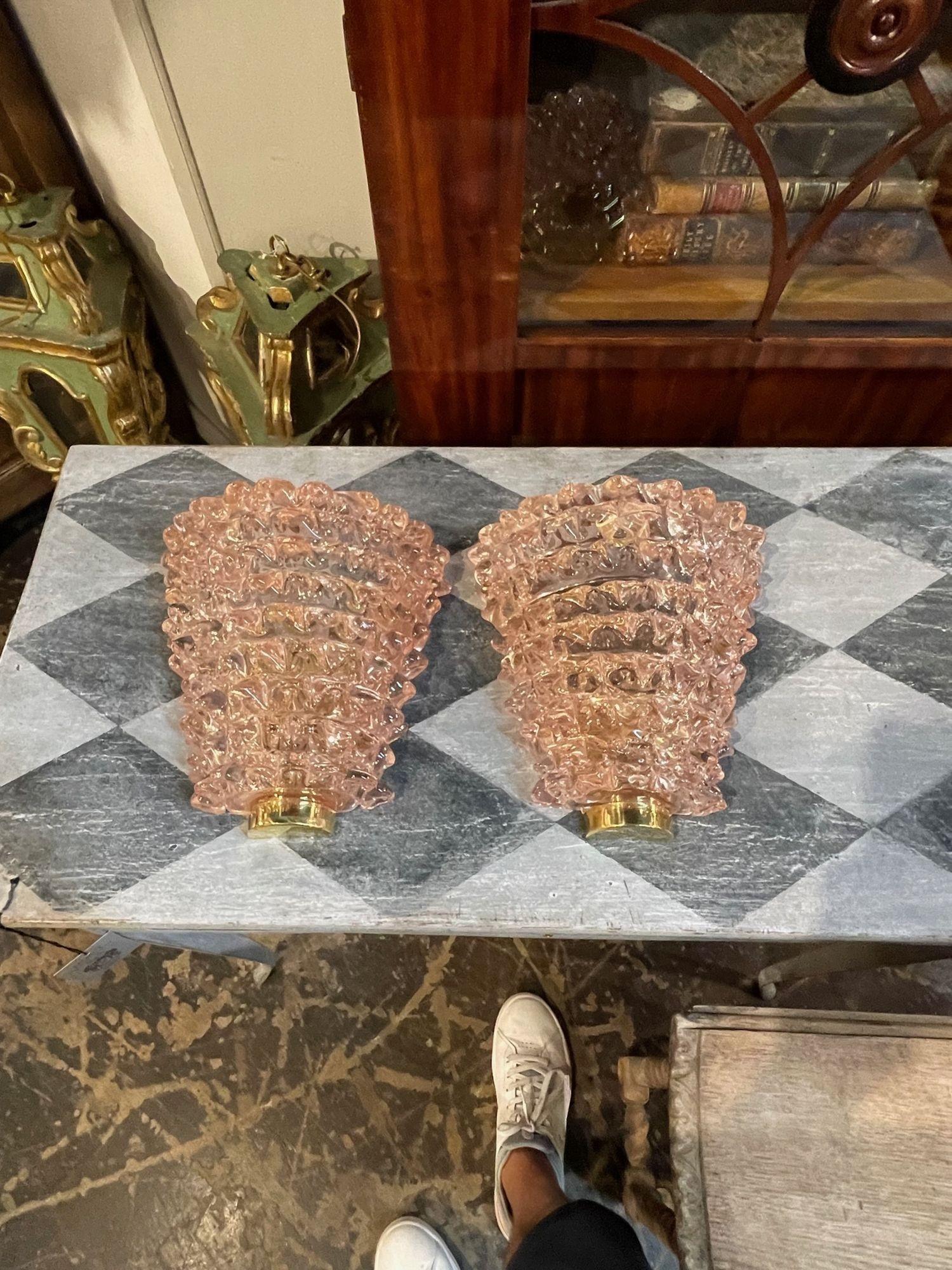 Stylish pair of pink Rostri Murano glass sconces. Creates a beautiful textural look. Very special! Perfect for a gorgeous design element!