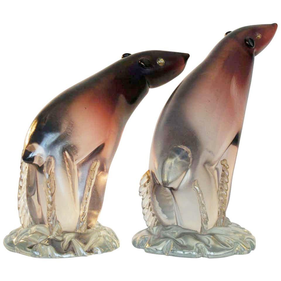 Adorable hand blown Murano polar bear sculptures by Alfredo Barbini, circa 1935, Italy.
The Colour runs from aubergine bleeding in to opalescent clear iridized glass.
Alfredo Barbini, glass artist born in 1912, was one of Murano’s leading figures of