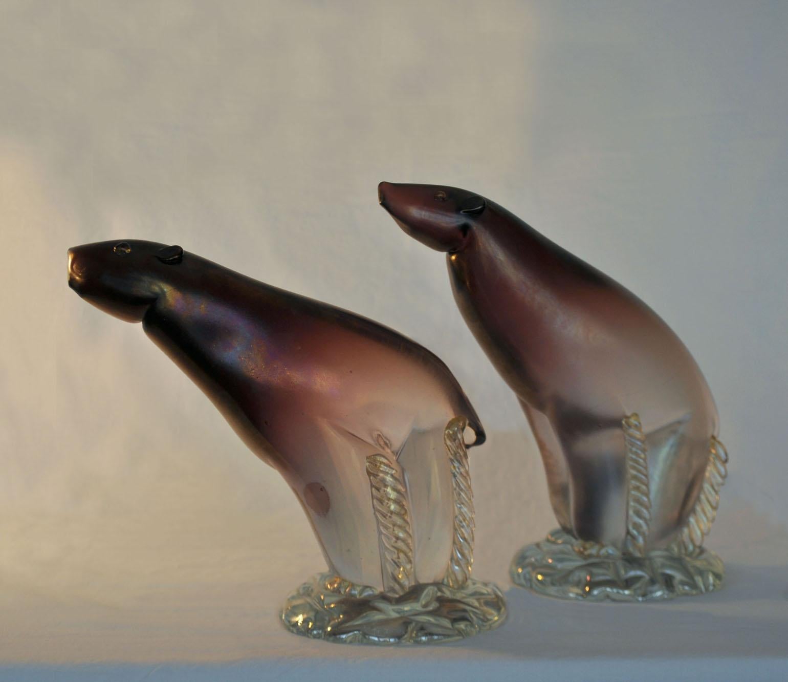 Hand blown Muralo polar bear sculptures by Alfredo Barbini, late 1940s-early 1950s
Color runs from aubergine bleeding in to opalescent clear iridized glass.
Alfredo Barbini, glass artist born in 1912, was one of Murano’s leading figures of the