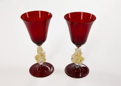 Pair of Murano Ruby Red Glass Goblets with Gold Leaf Sea Dragon Stems, 1970s