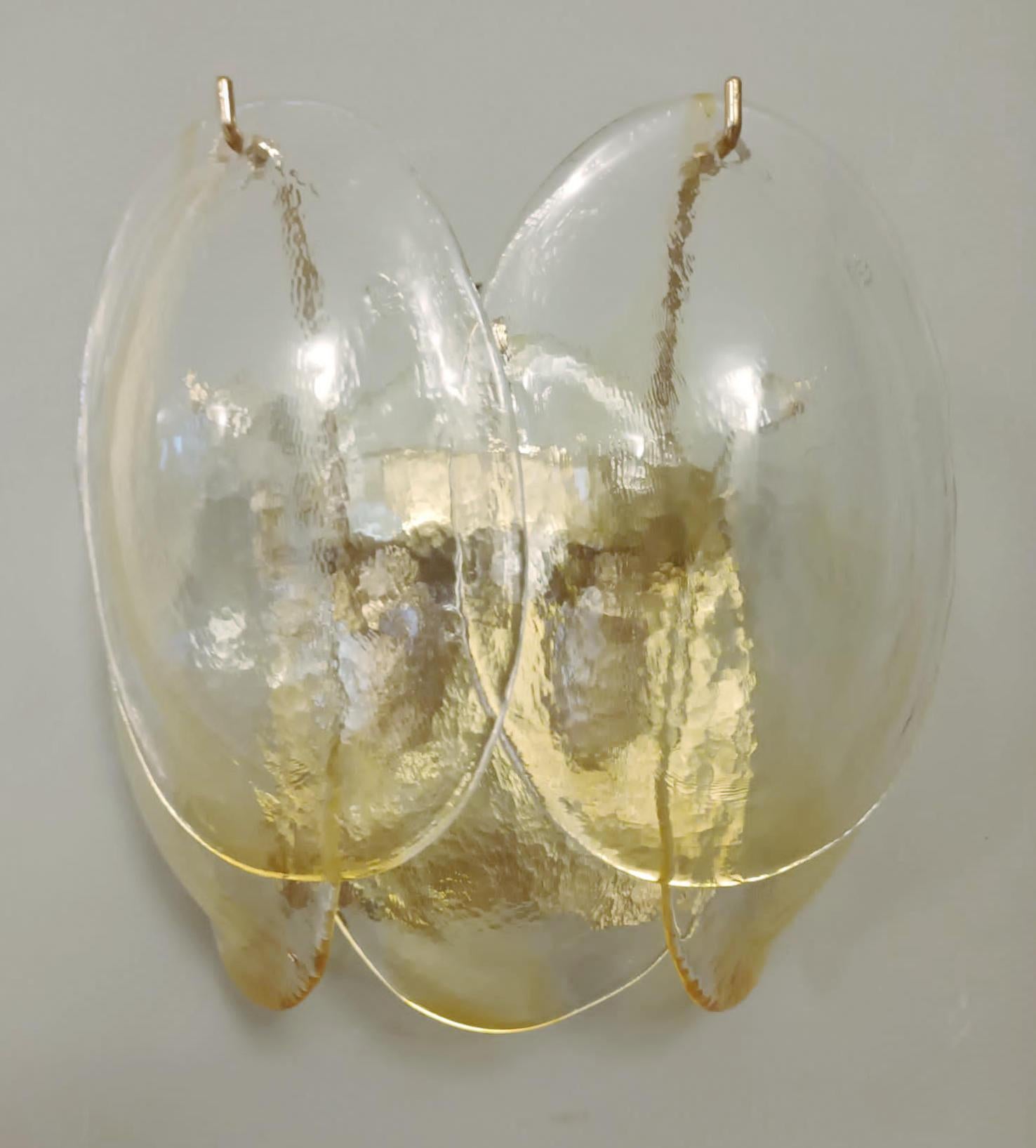 Vintage Italian chandelier with clear and amber glass shells suspended on brass frame / Made in Italy by La Murrina, circa 1980s
Original mark on glasses and frame 
Measures: height 9 inches, width 9 inches, depth 7 inches
2 lights / E12 or E14