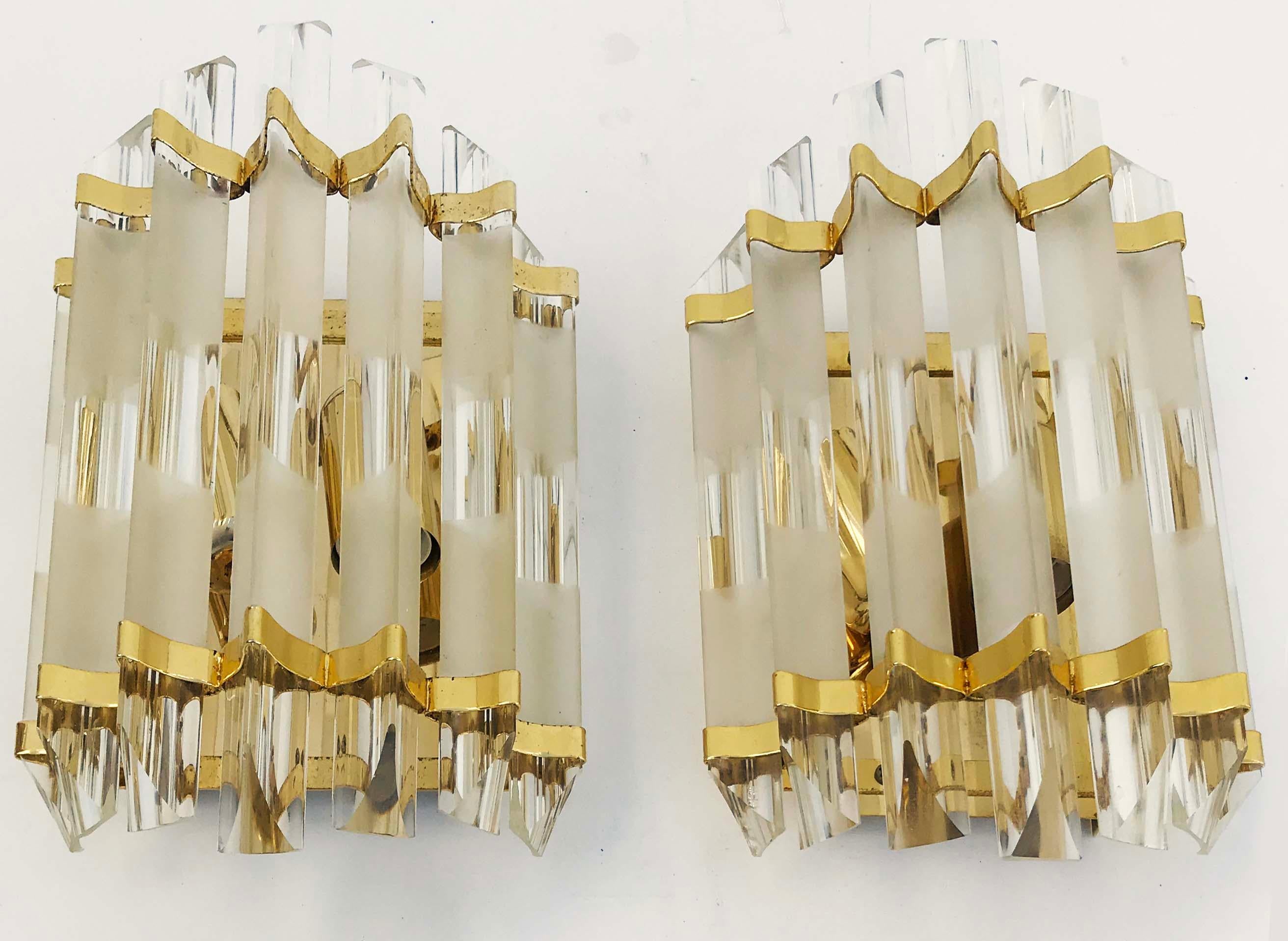 Superb pair of Murano sconces, frost and clear glass rod on a gilded gold color frame
2 light, 60 watts max bulb
US wired and in working condition. 
Measures: Back plate: 8