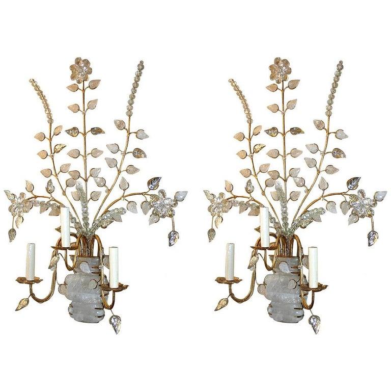 A pair of circa 1950's Murano glass floral motif light fixtures with six interior light each. Sold individually.

Measurements:
Diameter: 25