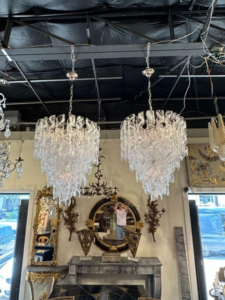 Modern pair of Murano spiral tube glass waterfall chandeliers. These chandeliers has been professionally rewired, comes with matching chain and canopy. They are ready to hang!
