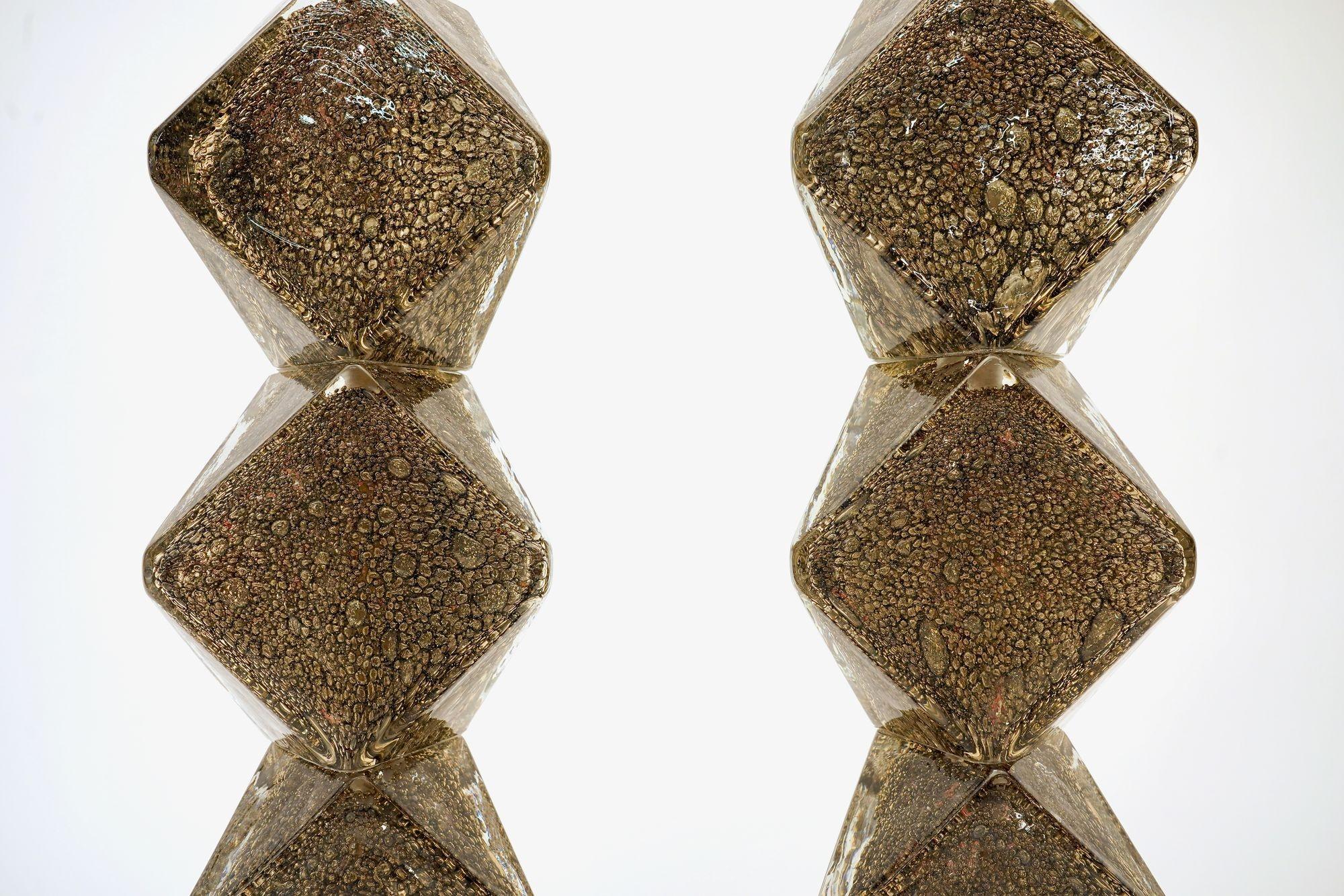 Pair of Deep Pulegoso Murano Table Lamps by Alberto Donà — Maestro Collection
A pair of table lamps created and hot-shaped at the Alberto Donà furnace, each composed of three angular, prismatic solid forms executed in a deep, richly textured