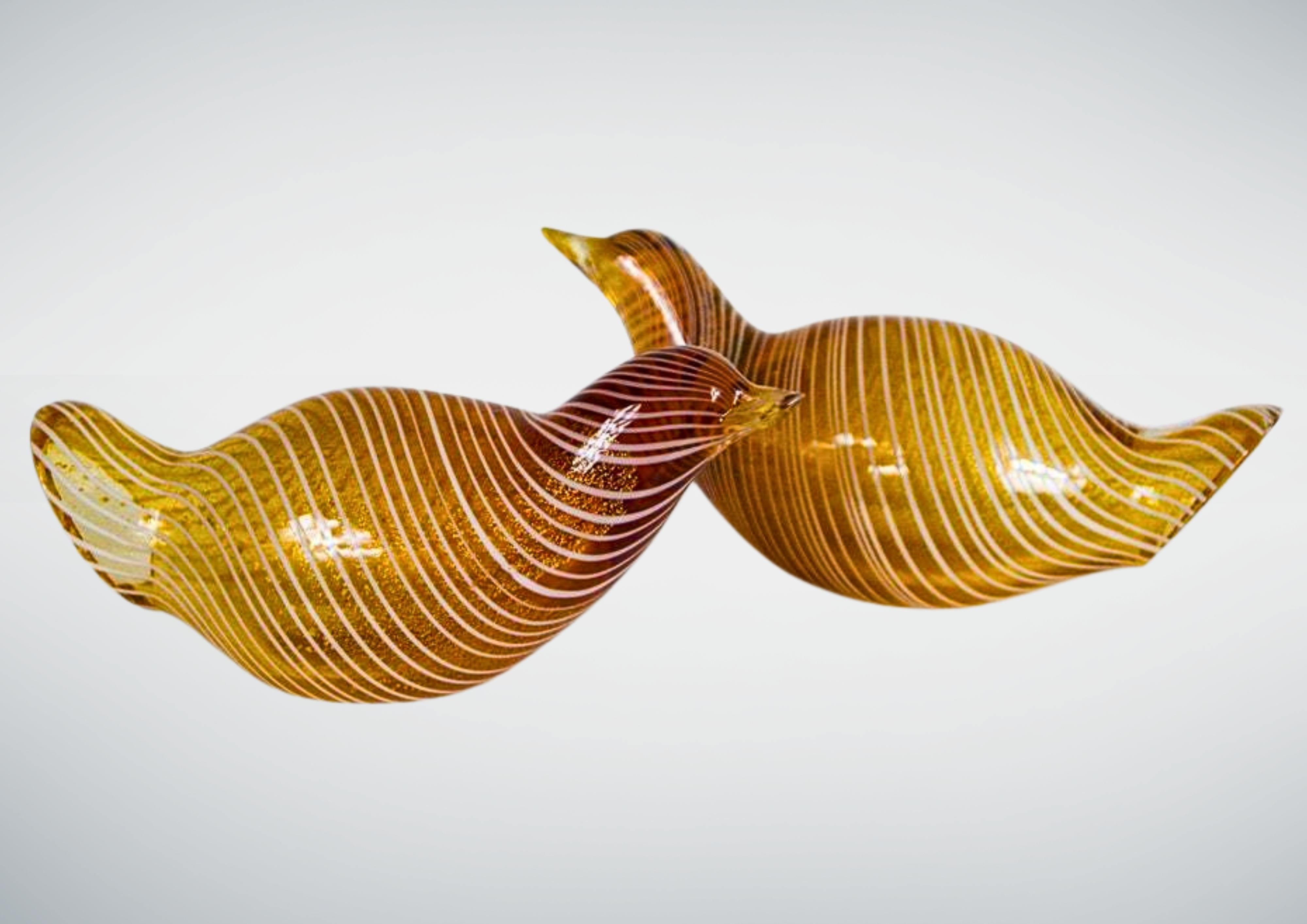 Mid-Century Murano zamfirico glass birds by Licio Zanetti, circa 1960s.
Charming sculptures of quail birds in cordonato d'oro and with zamfirico swirly white pattern.
Both sculptures signed to the base 'Zanetti L'.
In very good vintage condition