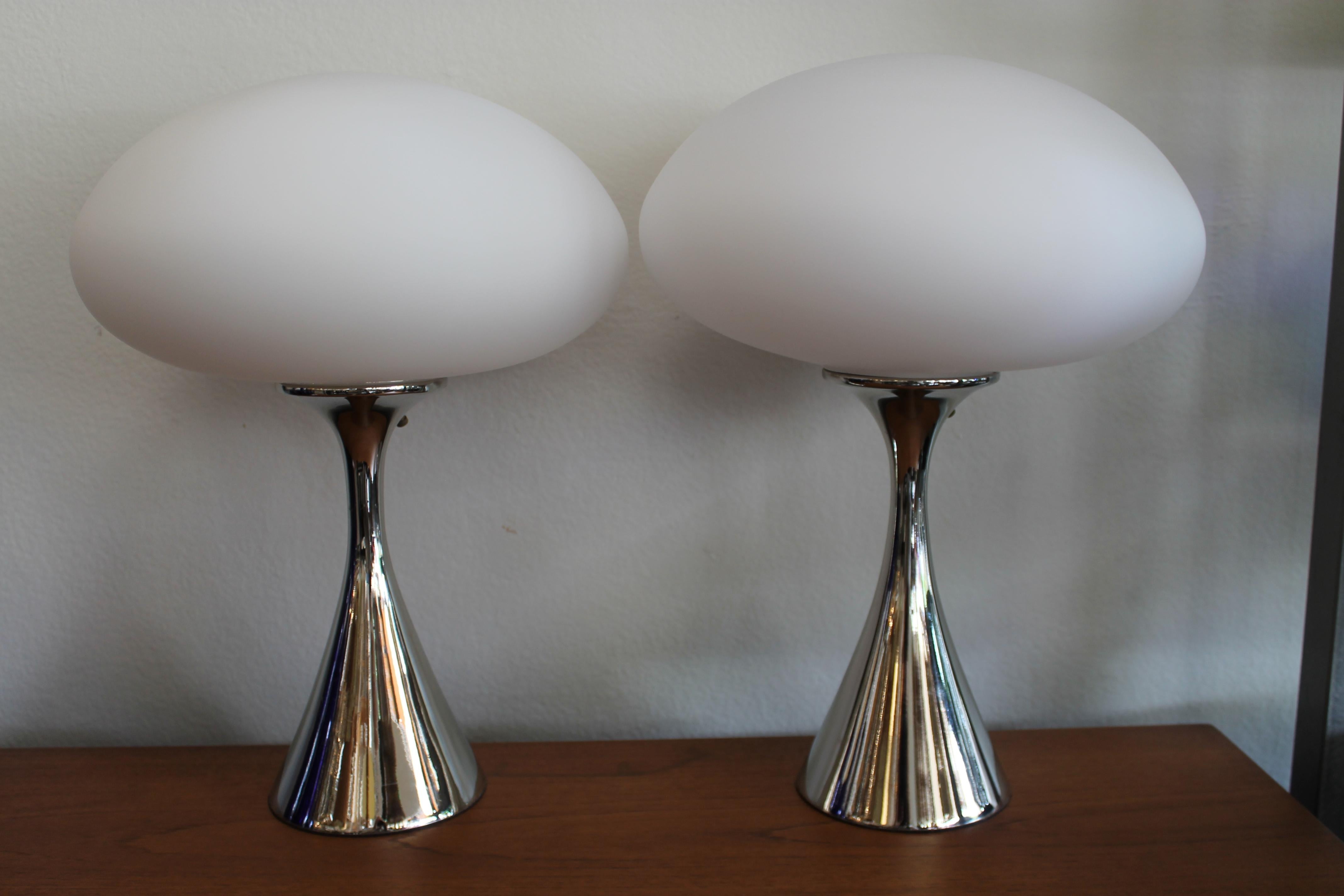 Pair of satin-plated lamps by the Laurel Lamp company, Newark, N.J. Both lamps have the Laurel label. 
 Lamps measure 17