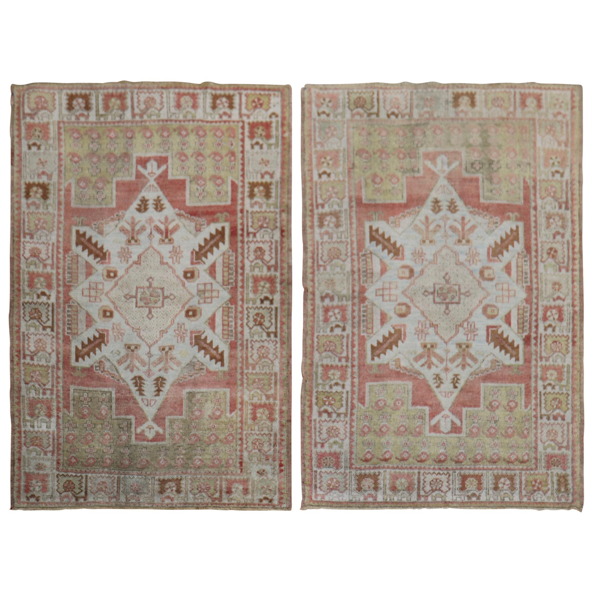 Pair of Muted Vintage Turkish Oushak Rugs For Sale