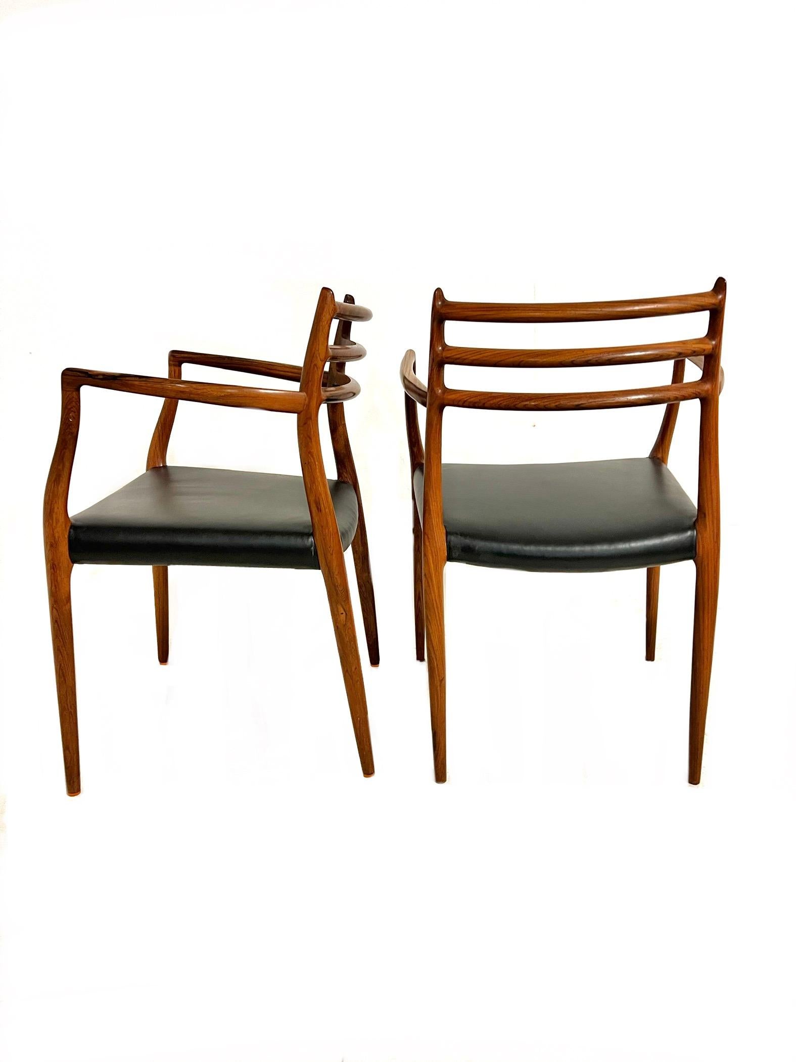 Danish Pair of N. O. Møller armchairs for J. L. Møller, Denmark 1962 For Sale