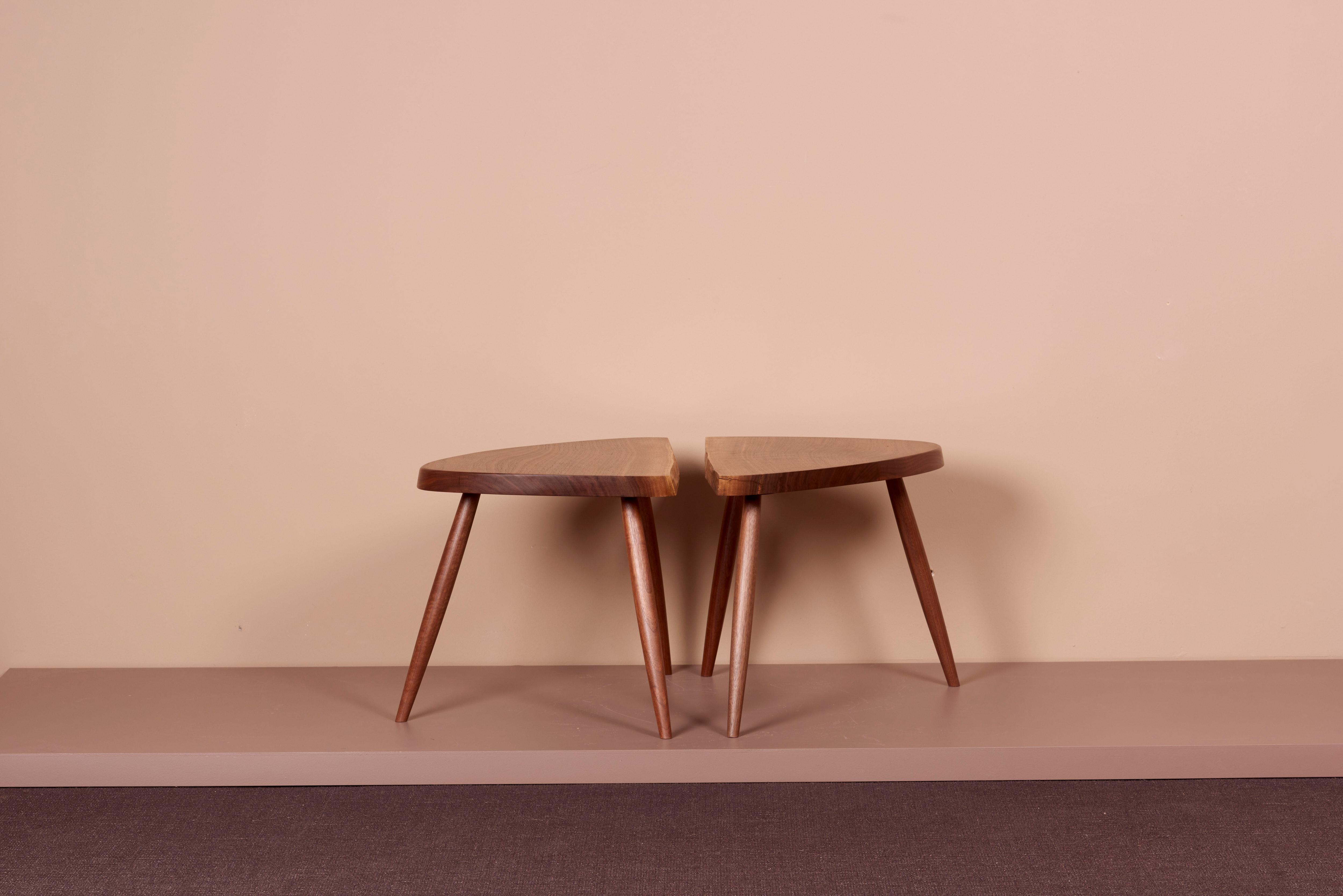 Pair of Nakashima Studio Mira Nakashima wepman side tables in walnut, US 2021. The table are made in black walnut and signed.
 