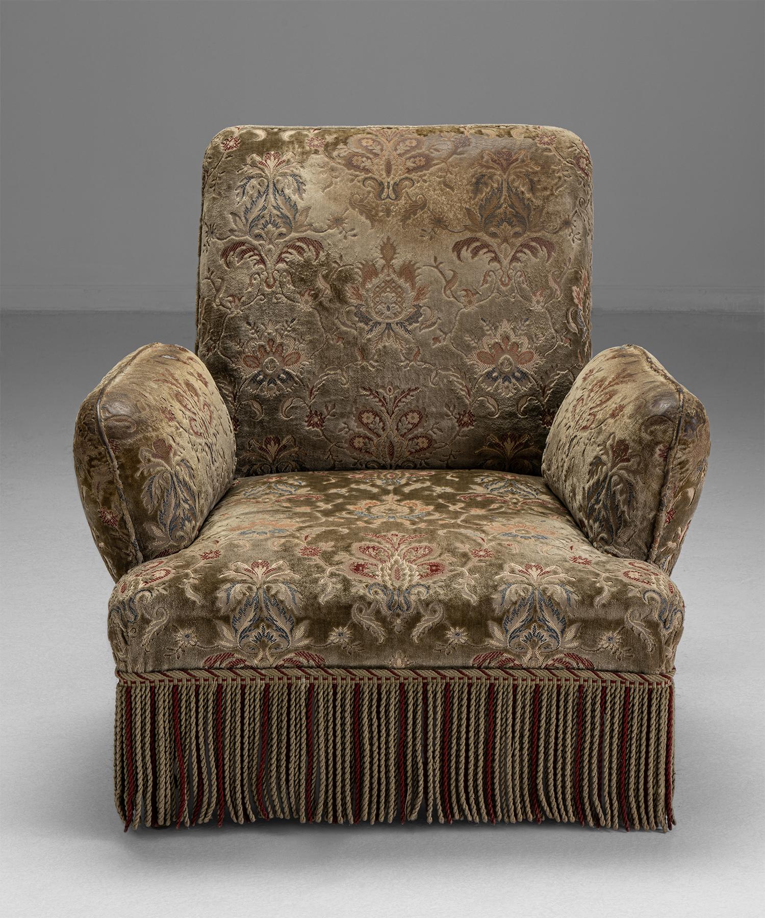 Pair of Napoleon III armchairs

France Circa 1860

Original velvet upholstery and fringe, on ebonised legs.

Measures: 32”W x 32”D x 32.25”H x 14” seat.