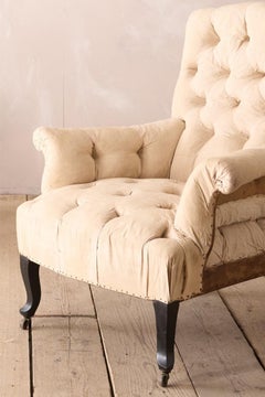 Pair of Napoleon III buttoned back and seat armchairs
