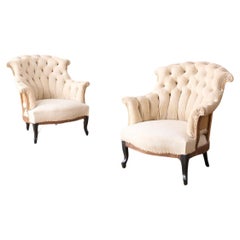 Antique Pair of Napoleon III buttoned fishtail armchairs
