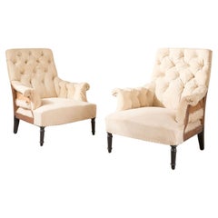 Pair of Napoleon III buttoned square back armchairs