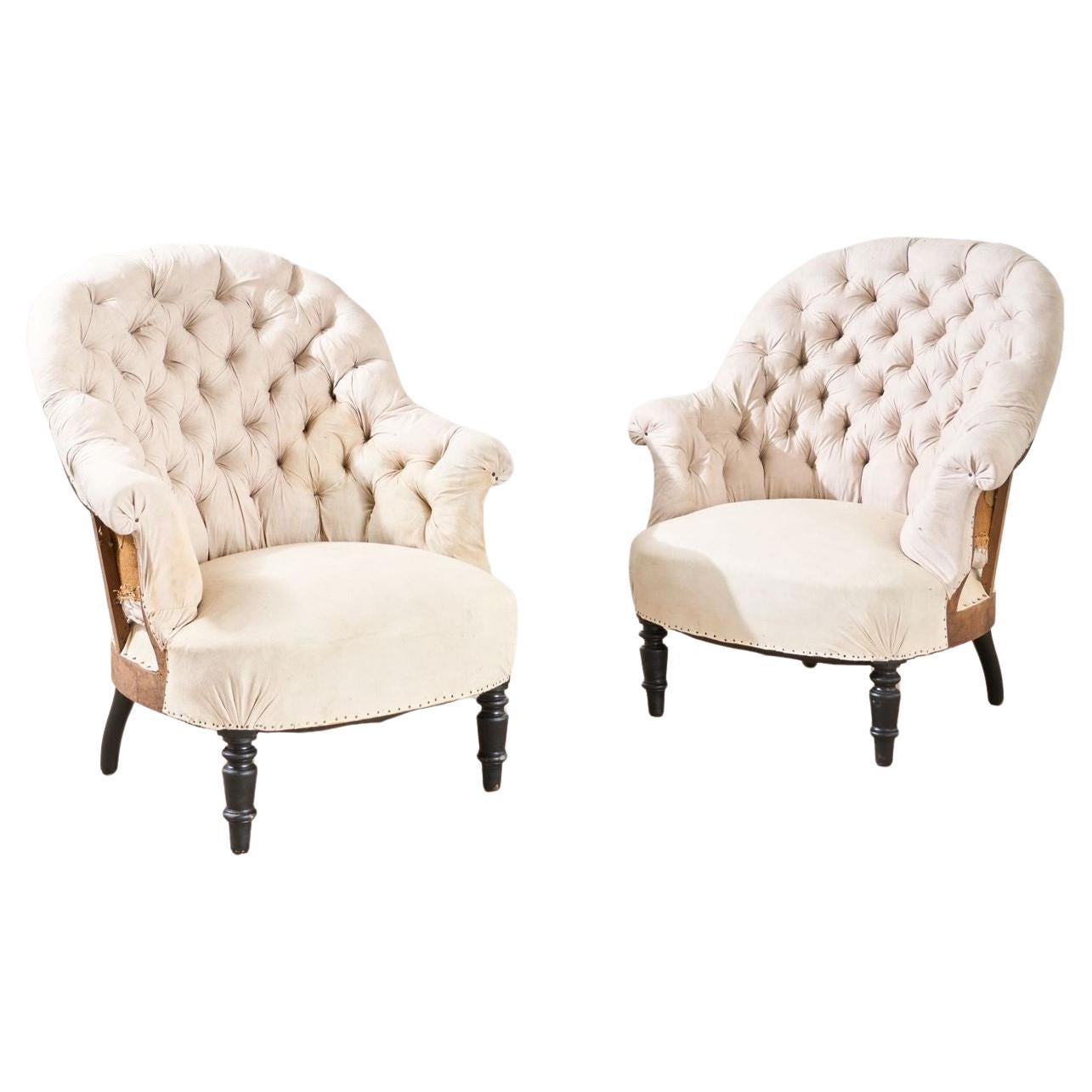 Pair of Napoleon III buttoned tub chairs
