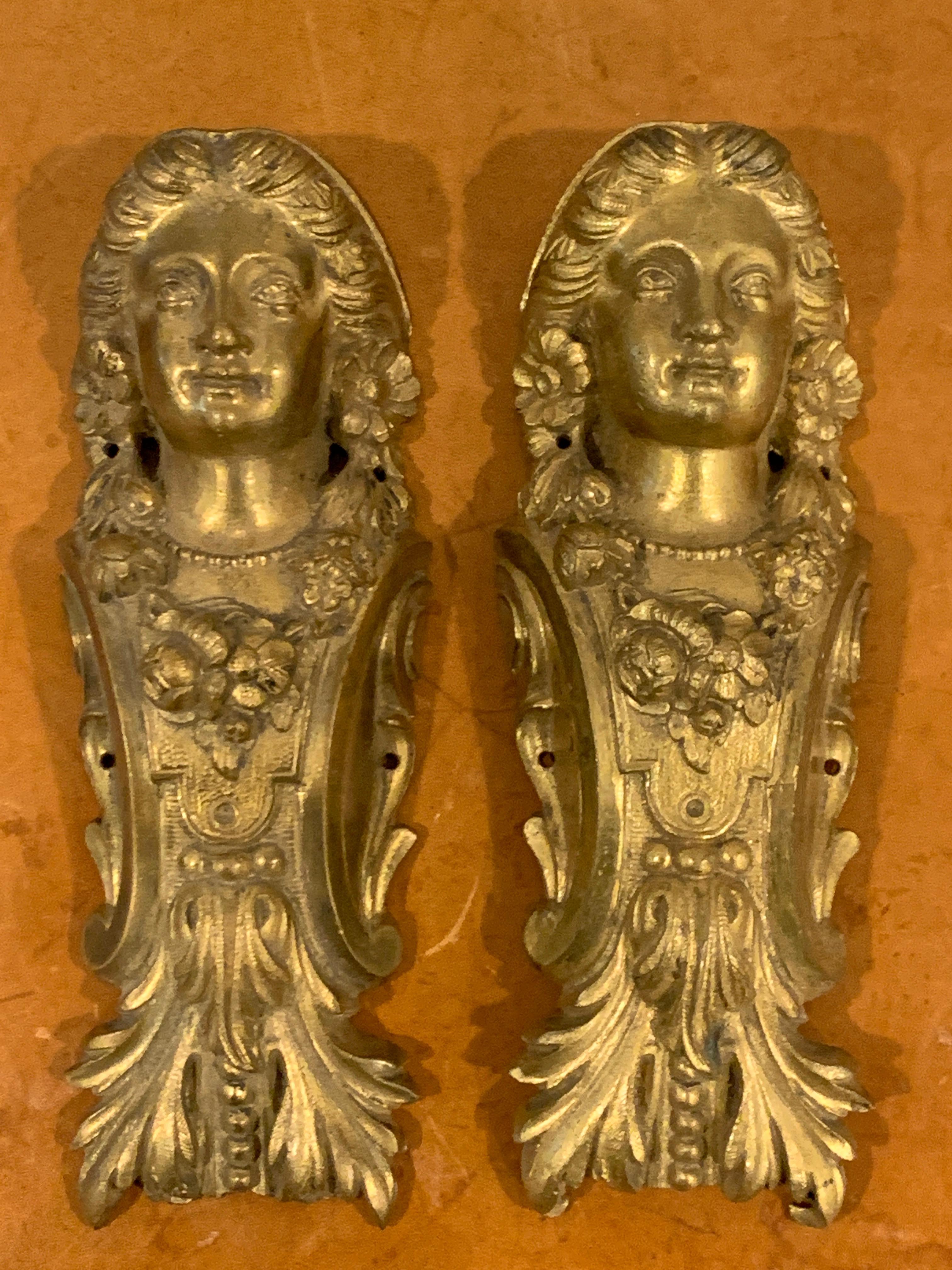 Pair of Napoleon III gilt bronze female medallion furniture mounts, each one finely cast and detailed.