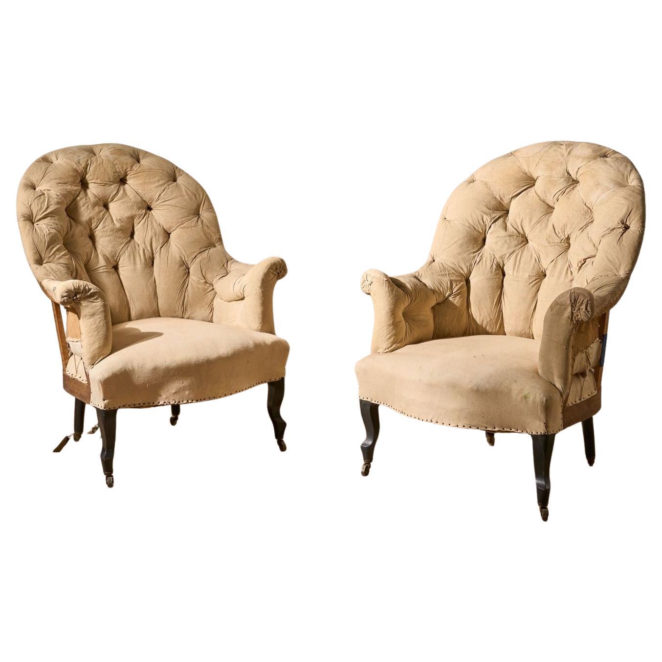 Pair of Napoleon III High buttoned curved back armchairs