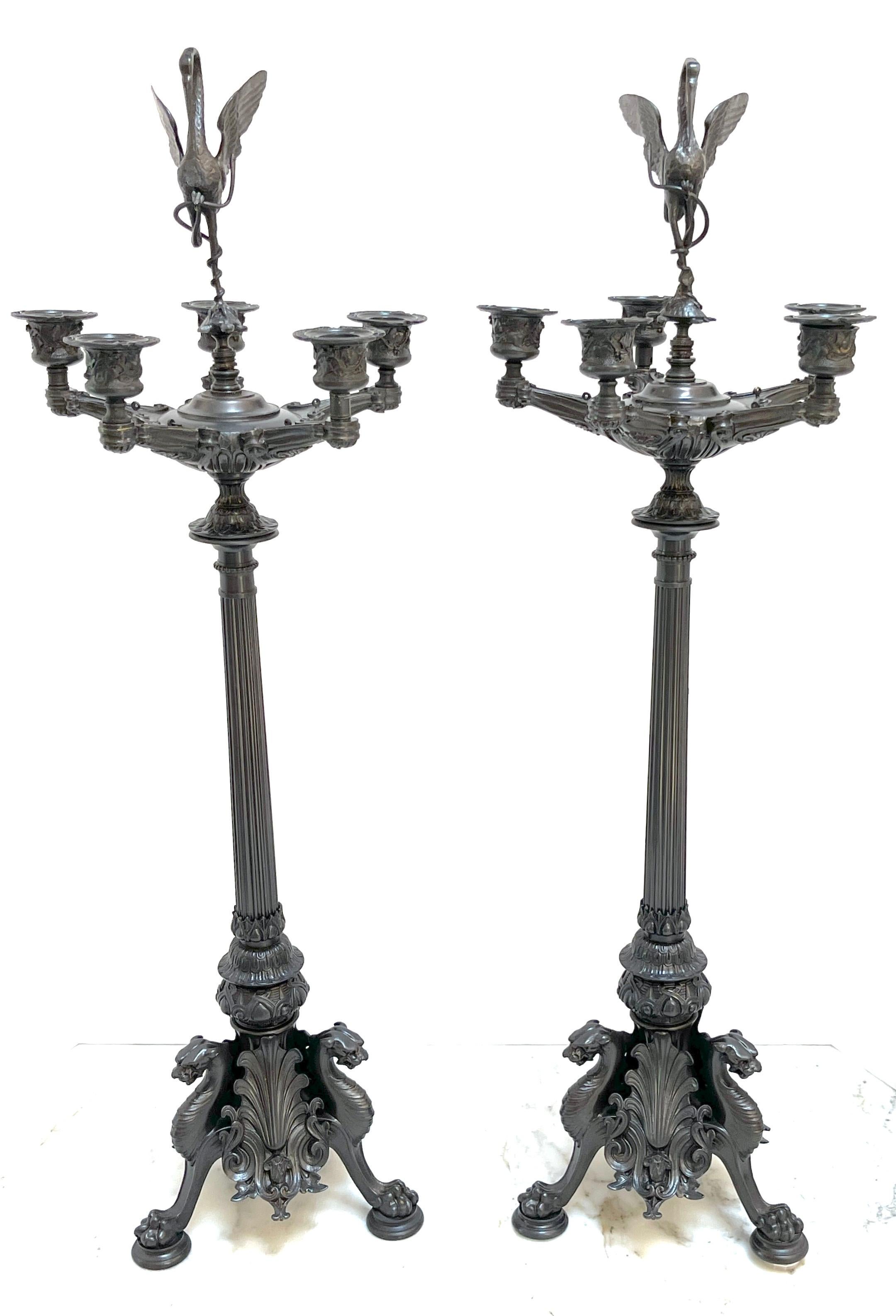 Pair of Napoleon III Patinated Bronze Patina 5-Light Candelabra
France Circa 1870s

A exquisite pair of Napoleon III patinated bronze candelabra, crafted in France during the 1870s. Standing at an impressive 30 inches tall, these candelabra are a
