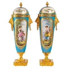 Pair of Napoleon III Period Covered Vases in Sèvres Porcelain and Gilt Bronze.