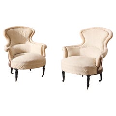 Pair of Napoleon III Piecrust fishtail armchairs