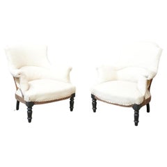 Pair of Napoleon III plain shield back armchairs