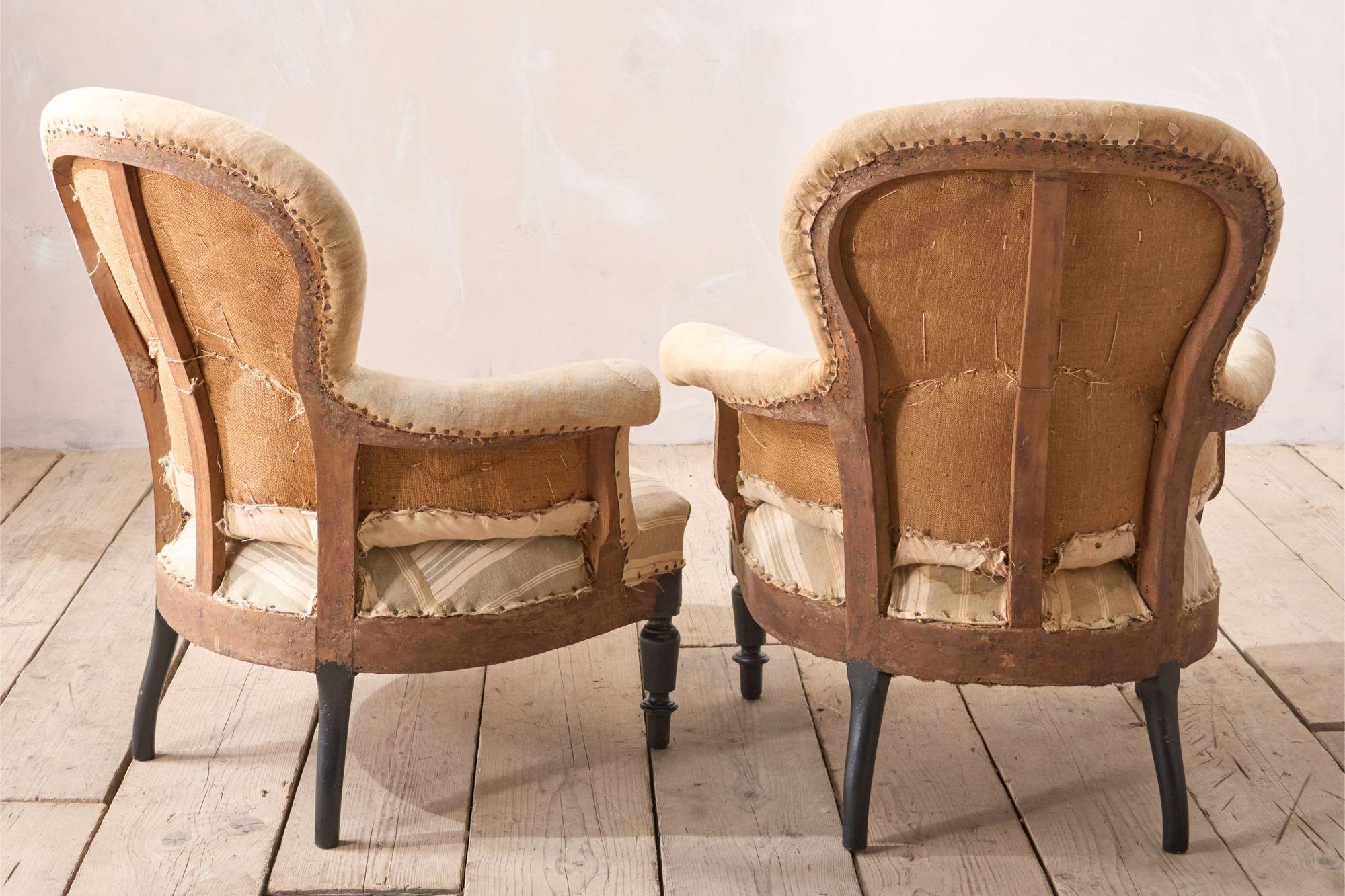 Beech Pair of Napoleon III plain spoon back armchairs