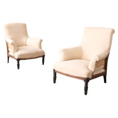 Pair of Napoleon III scroll back armchairs