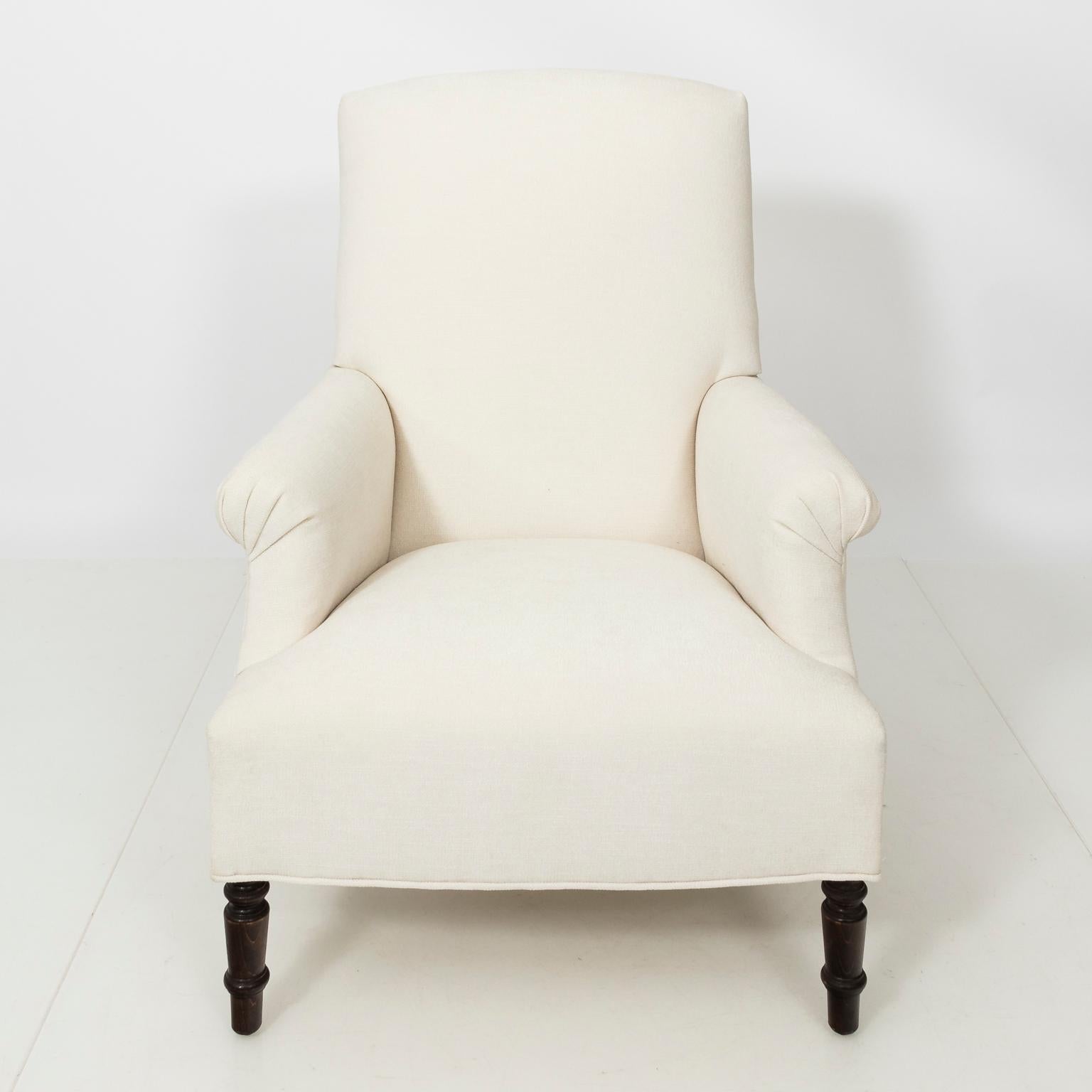 Pair of Napoleon III style armchair with oak ring turned legs in newly upholstered fabric.
 