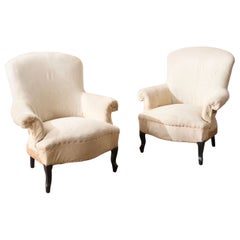 Antique Pair of Napoleon III Wide armed plain curved back armchairs