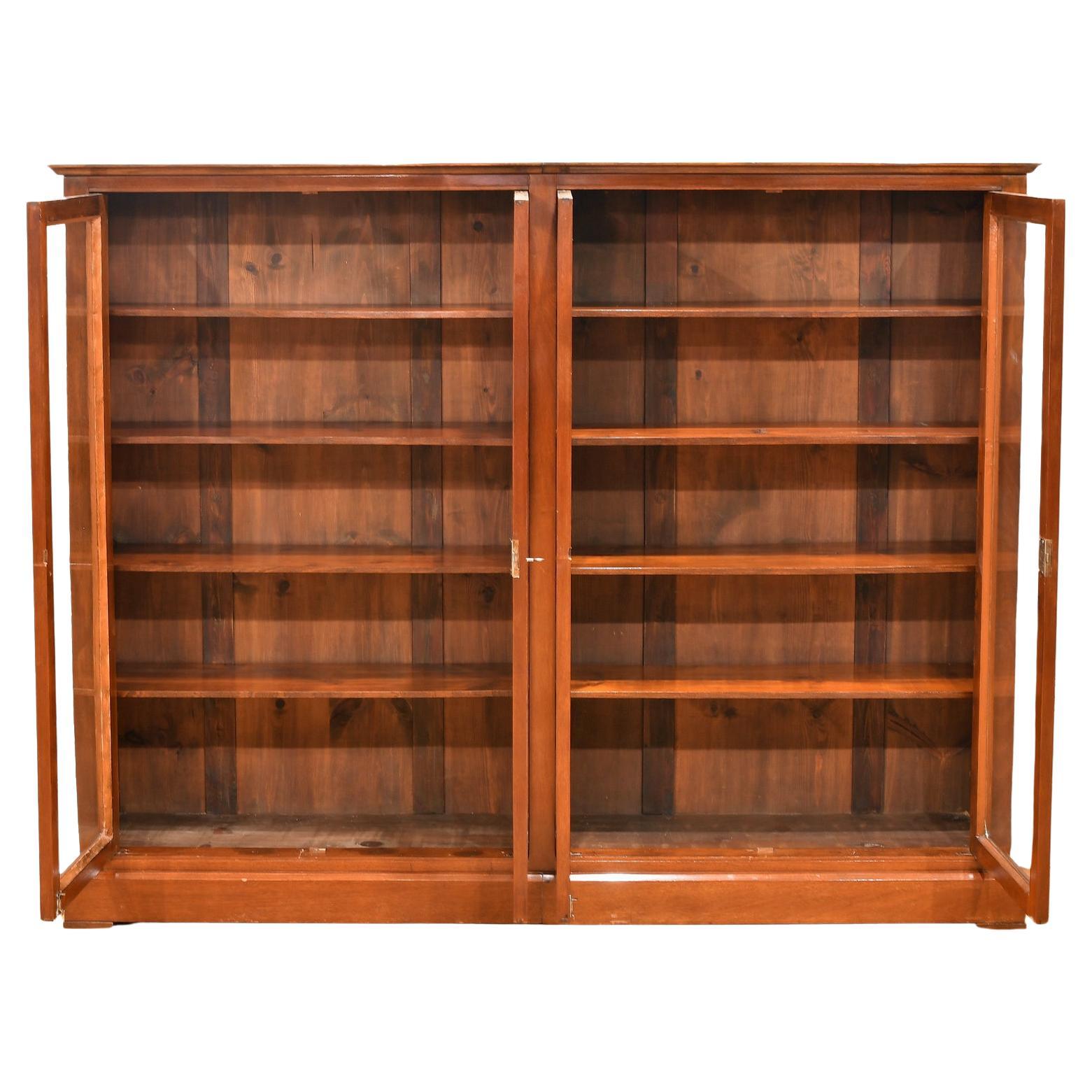 Polished Pair of Art Deco Bookcases in Mahogany with Glass Paneled Doors, Denmark, c 1920