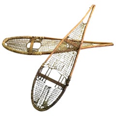 Pair of Native American Rawhide Pom Pom Snowshoes, Late 19th-Early 20th Century