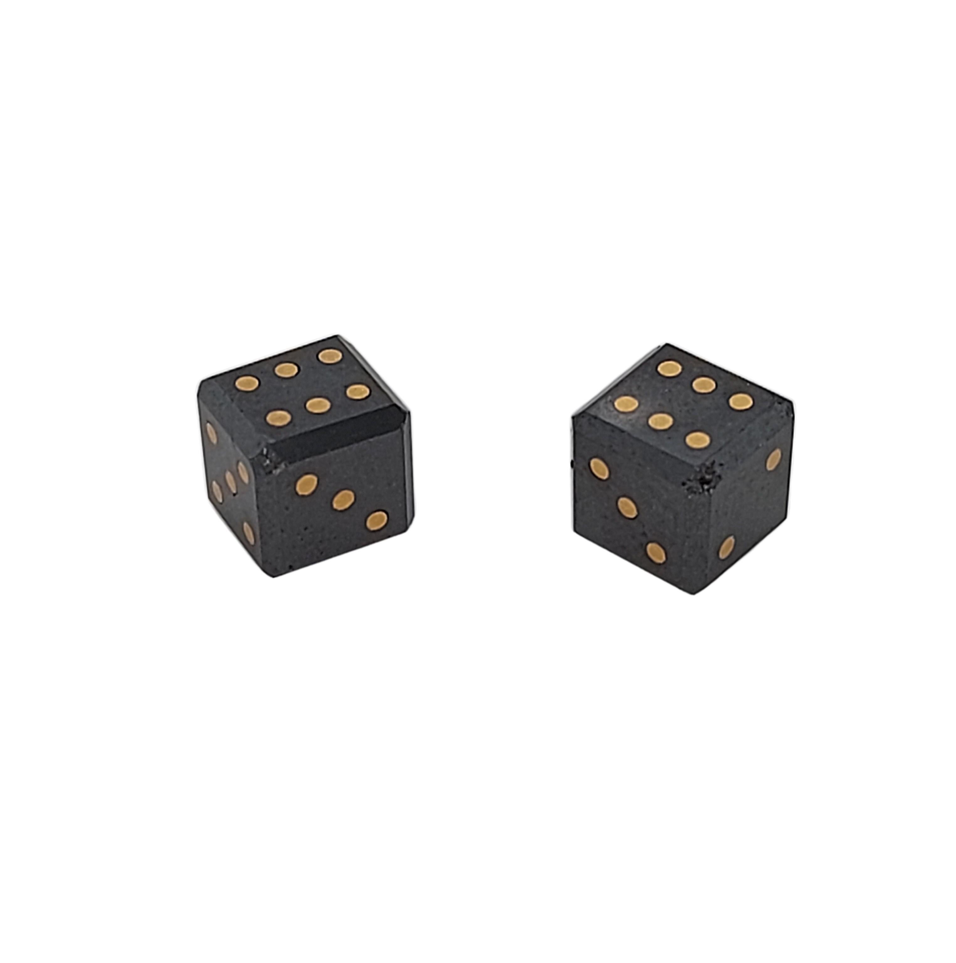 Pair of natural 15,4 Carat Black Diamond Cubes/Dice with gold inlay, 7.5 mm

The dice are inlaid with gold dots to mark their numbers.
The purity of the gold is not tested.

Measurements: 7.5 x 7.5 mm

Total weight: 3.1 gram / 0.110 oz / 2.0